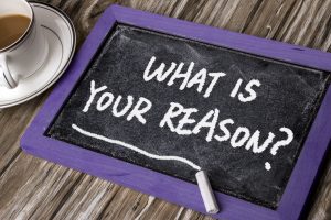 What is your reason? written on a chalk board