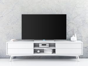tv sitting on top of a tv stand