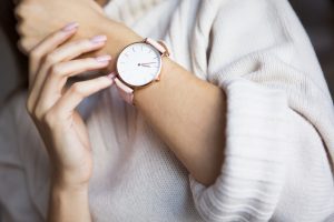 woman showing off her pink watch